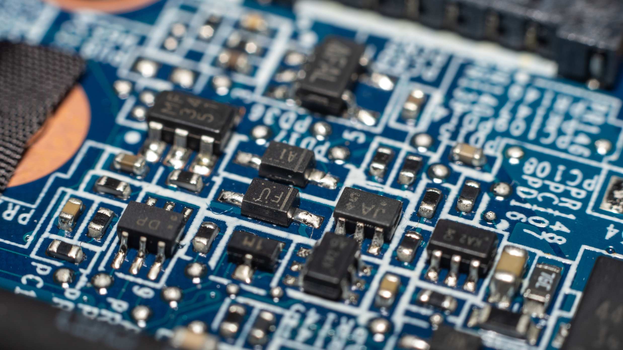 Close view of a circuit board with electronic components and chips